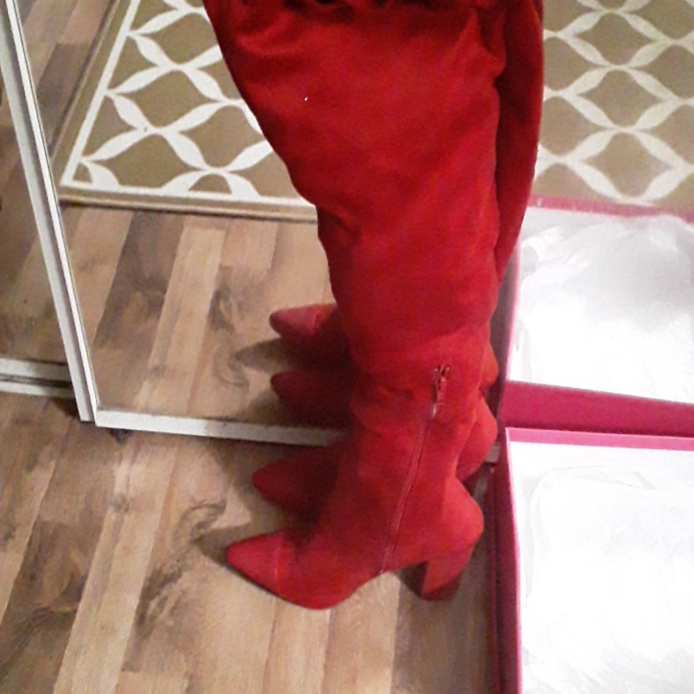 Knee high heel boots